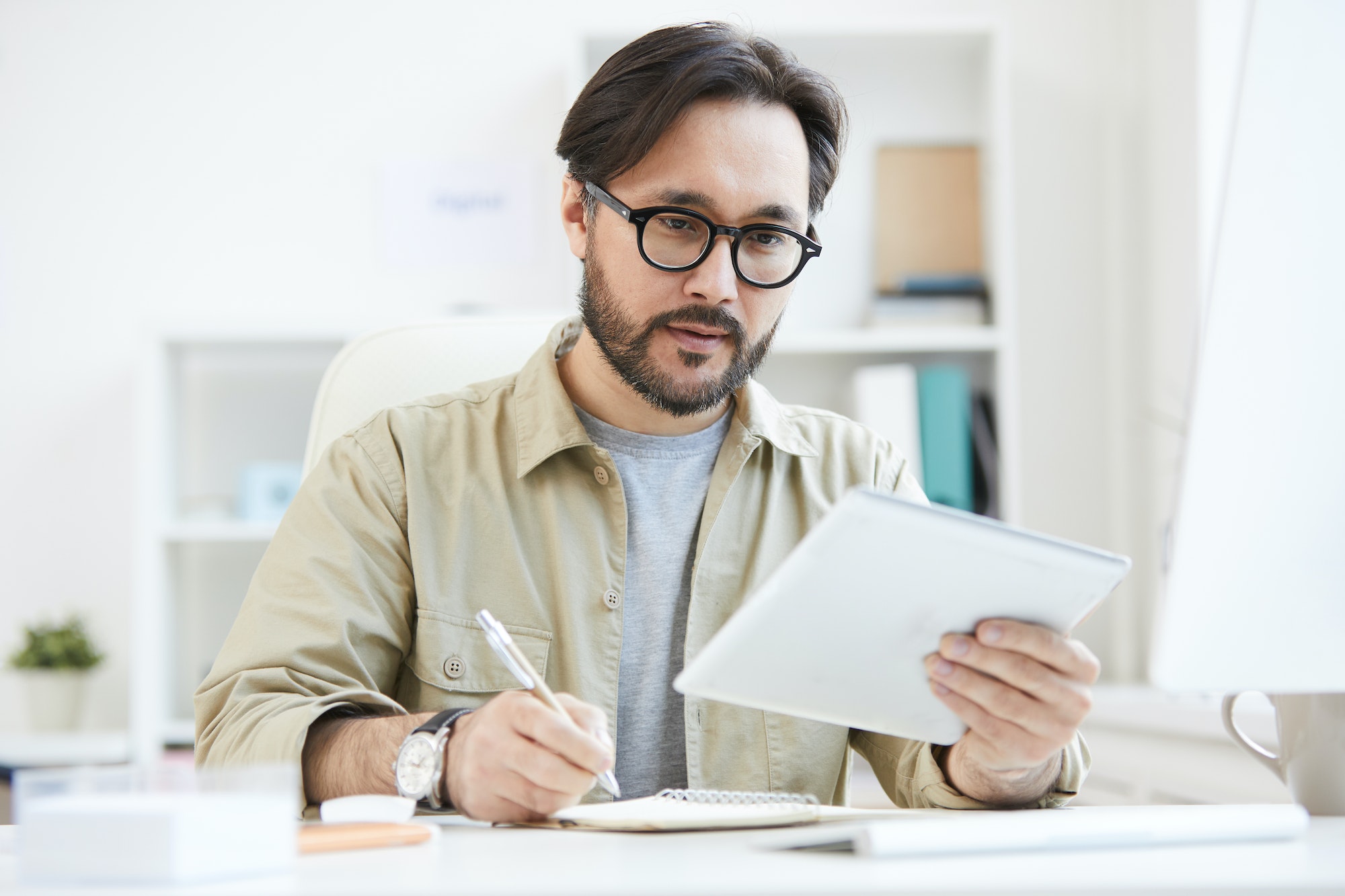 Young man performing market analysis